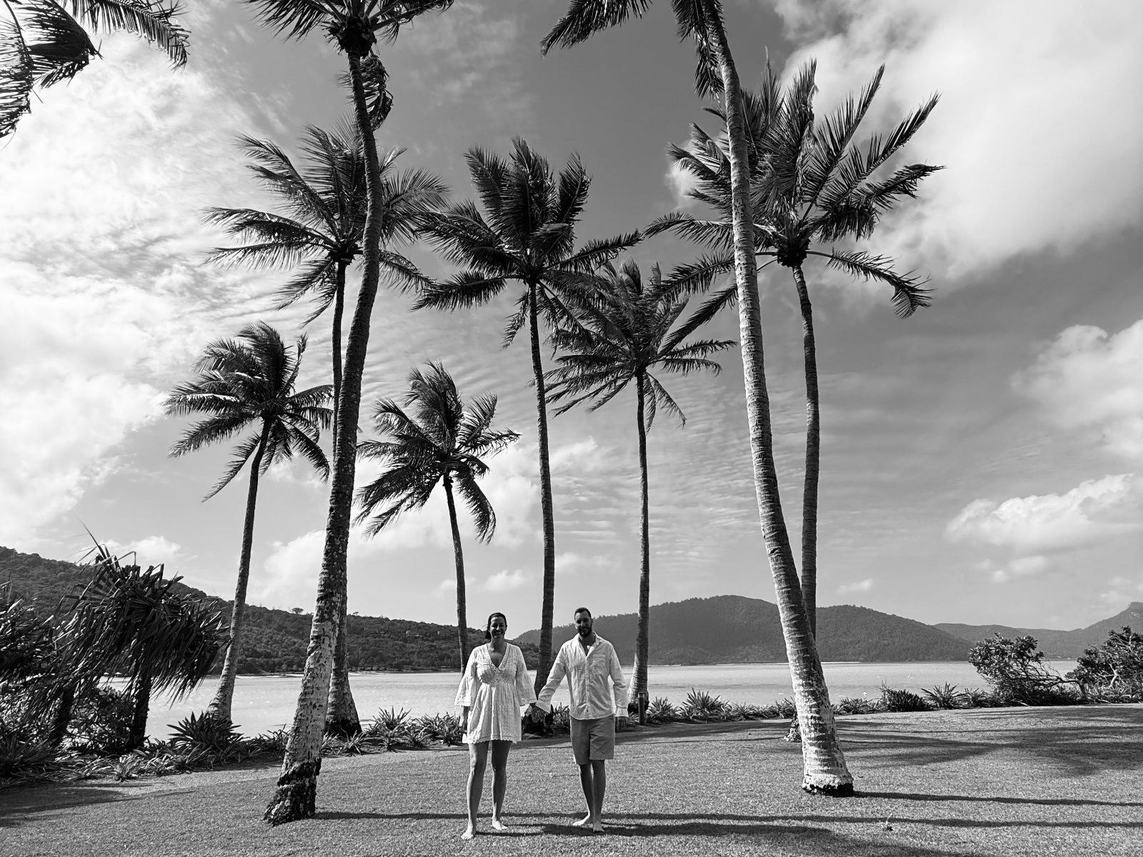 Tegan and Troy beneath the palms